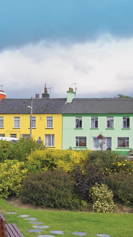 Colorful houses line a street in Sneem